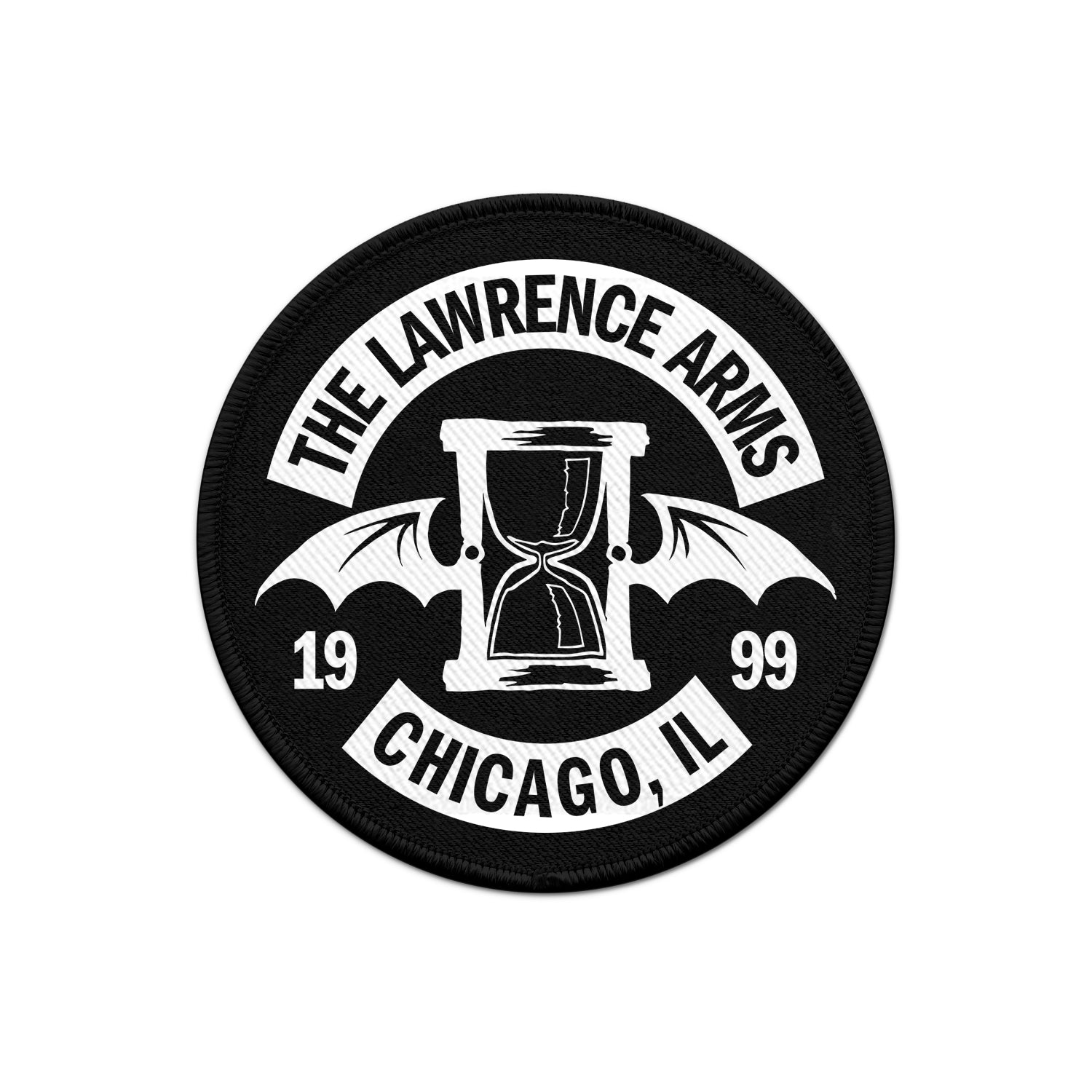 Image of a black and white embroidered patch against a white background. The patch is black and the center of it features the lawrence arms logo of an hourglass with wings, in white. Just below that are the numbers 1999. Above the logo in a banner says the lawrence arms. The banner is white with black text. Below the logo in the same style banner it says chicago, IL.