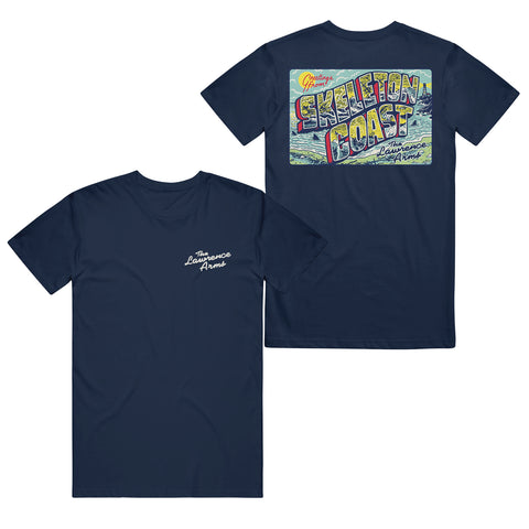 Image of the front and back of a navy tee against a white background. The left chest says The Lawrence Arms in white cursive. The back of the shirt has a graphic across the shoulder are that looks like a post card- it is colorful and says greetings from skeleton coast. the lawrence arms. there is a sun, some clouds, the oceans, and fins from sharks sticking out of the water. The words greetings from and the lawrence arms are in cursive. Skeleton coast is in large colorful bubble letters.