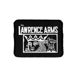 Image of a black embroidered patch against a white background. The patch says the lawrence arms in white text, and below that inside of a white outlined rectangle is a graphic of a king holding a sword behind his head.